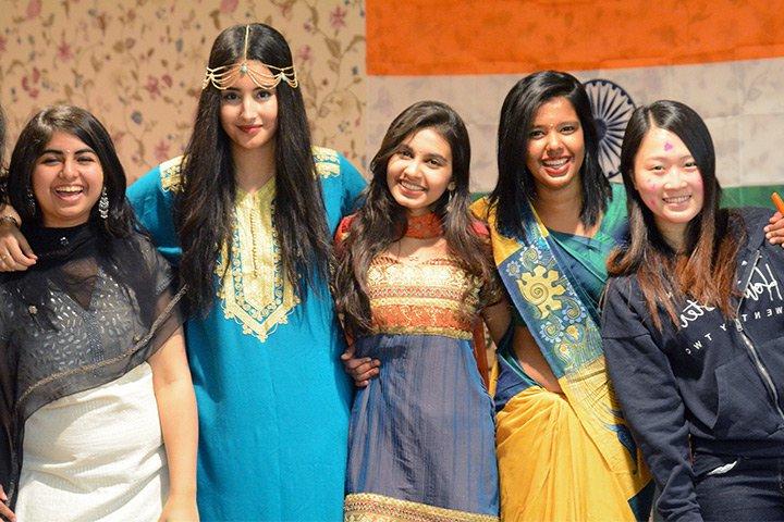 female students in cultural dress